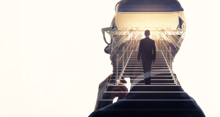 Double exposure of a businessman and stairs. Success of business concept.